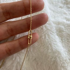 18 karat gold  pendant on chain 18”